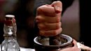 Wes mixes something medicinal